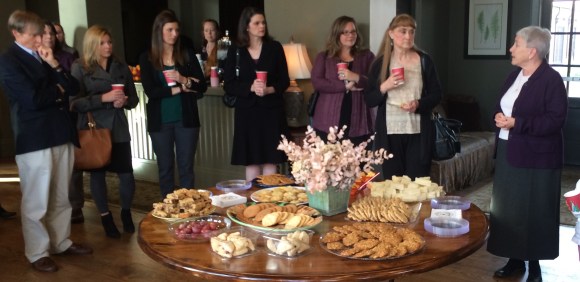 Katy Smith (r), a member of Jeannette's Support Team, speaks at Jeannette's memorial gathering at Birmingham Southern College.
